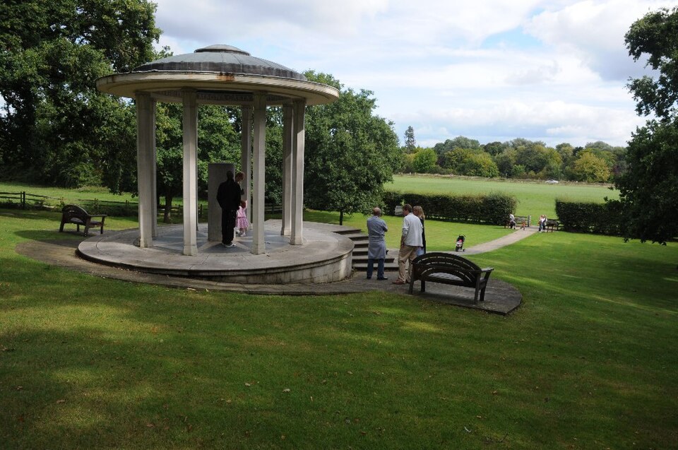 Columned circular Magna Carta memorial in the green landscape at Runnymede.