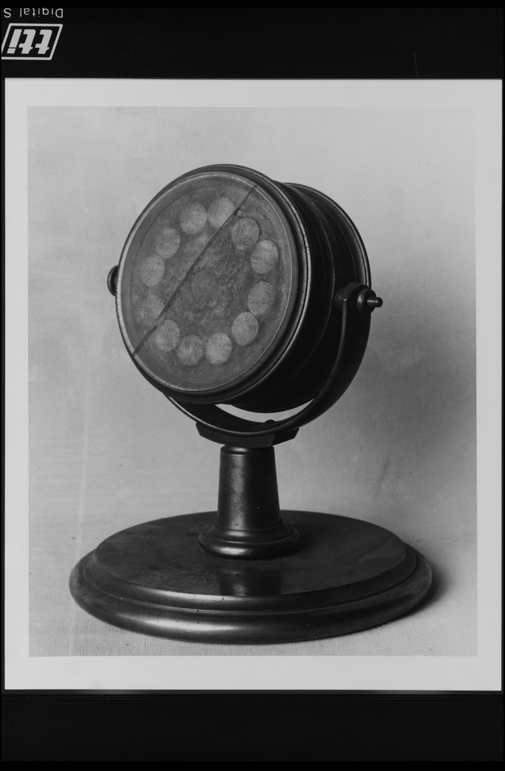Archival museum photograph of a mounted cross-section specimen of an Atlantic telegraph cable.