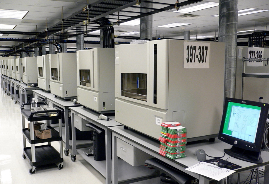 A row of Applied Biosystems 3730xl DNA sequencing machines, photographed in 2005.