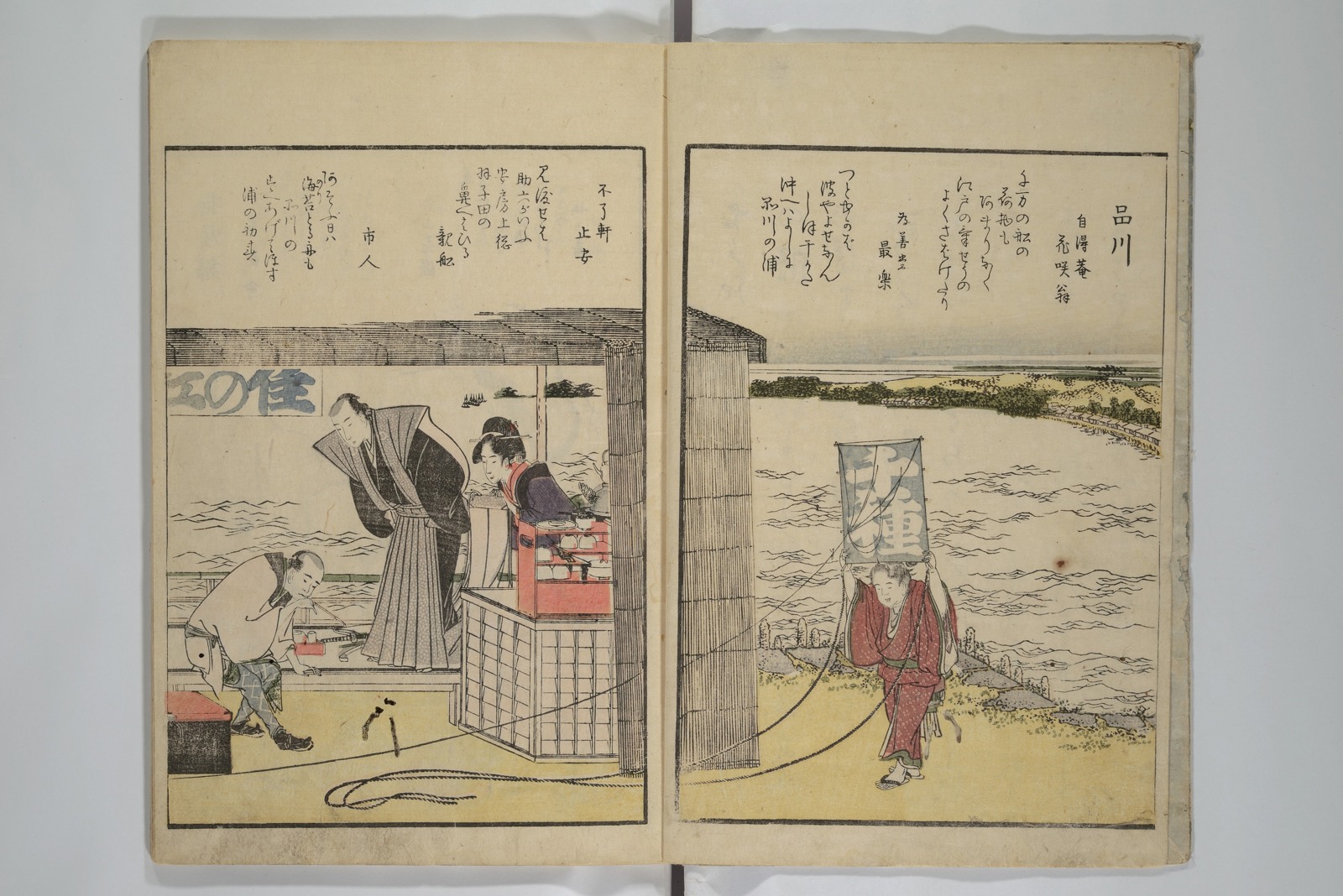An illustrated book opening from Hokusai’s colour-printed views of Edo, dated 1800.