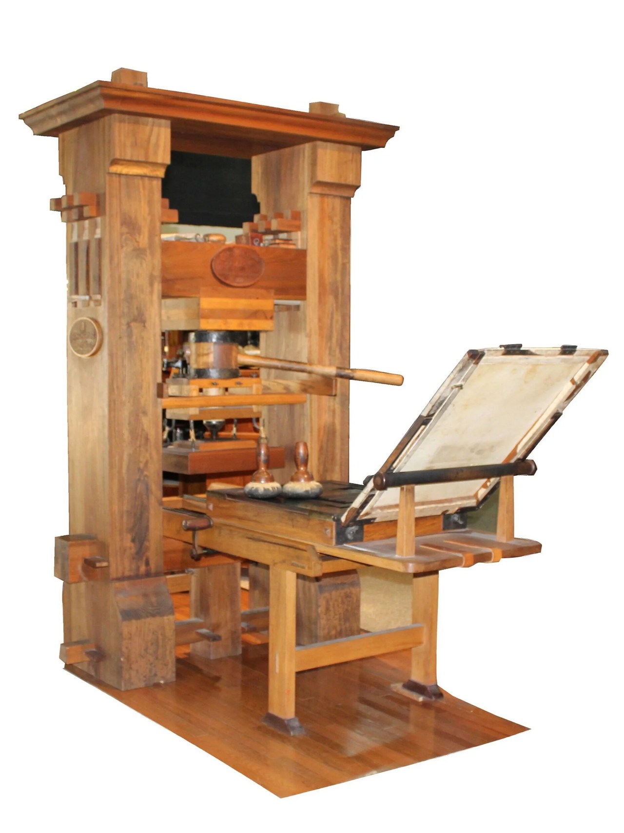 Wooden replica printing press with a large screw mechanism and printing bed