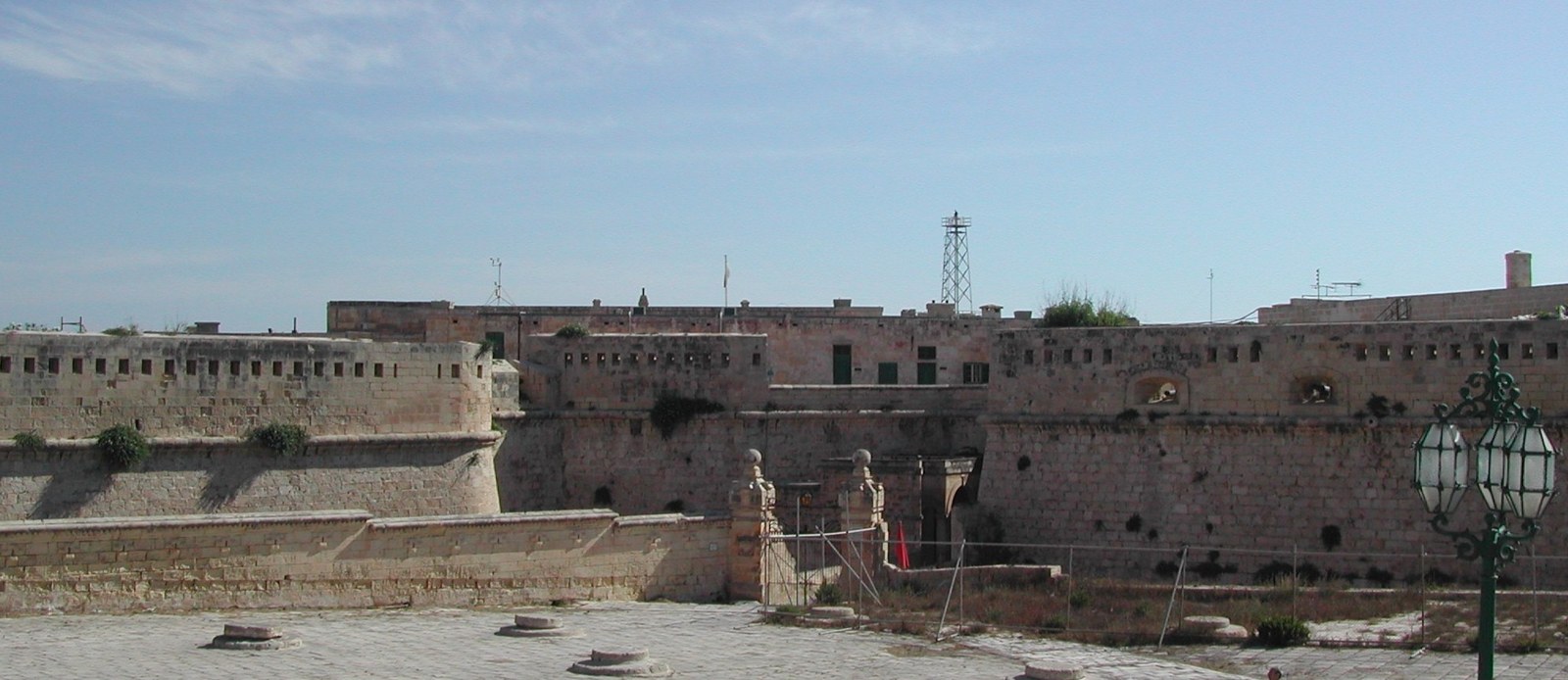 Modern photograph of the stone bastions, long buildings and entrance at Fort St Elmo.