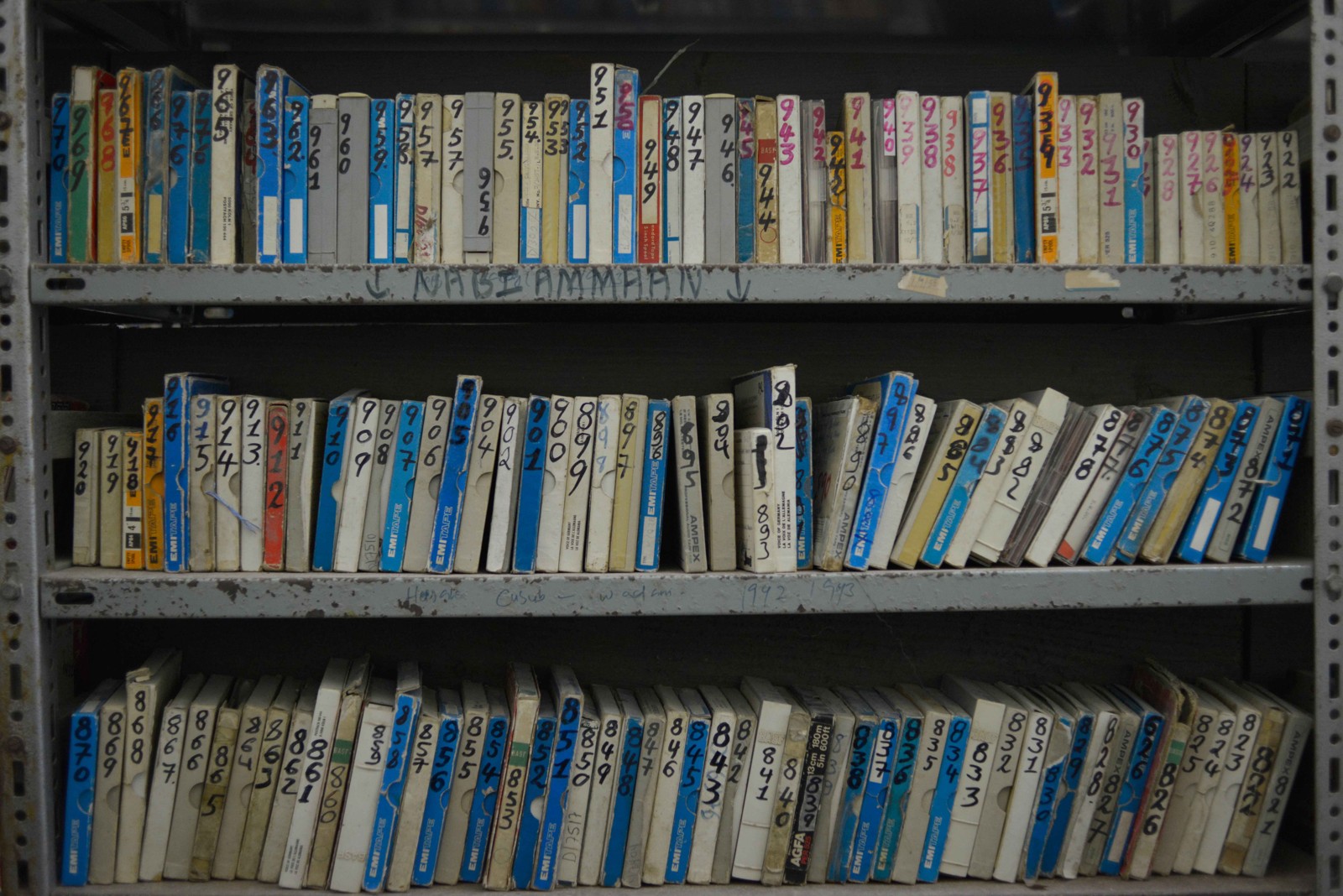 Shelves filled with labeled boxes of audio reels in Radio Mogadishu’s archive.
