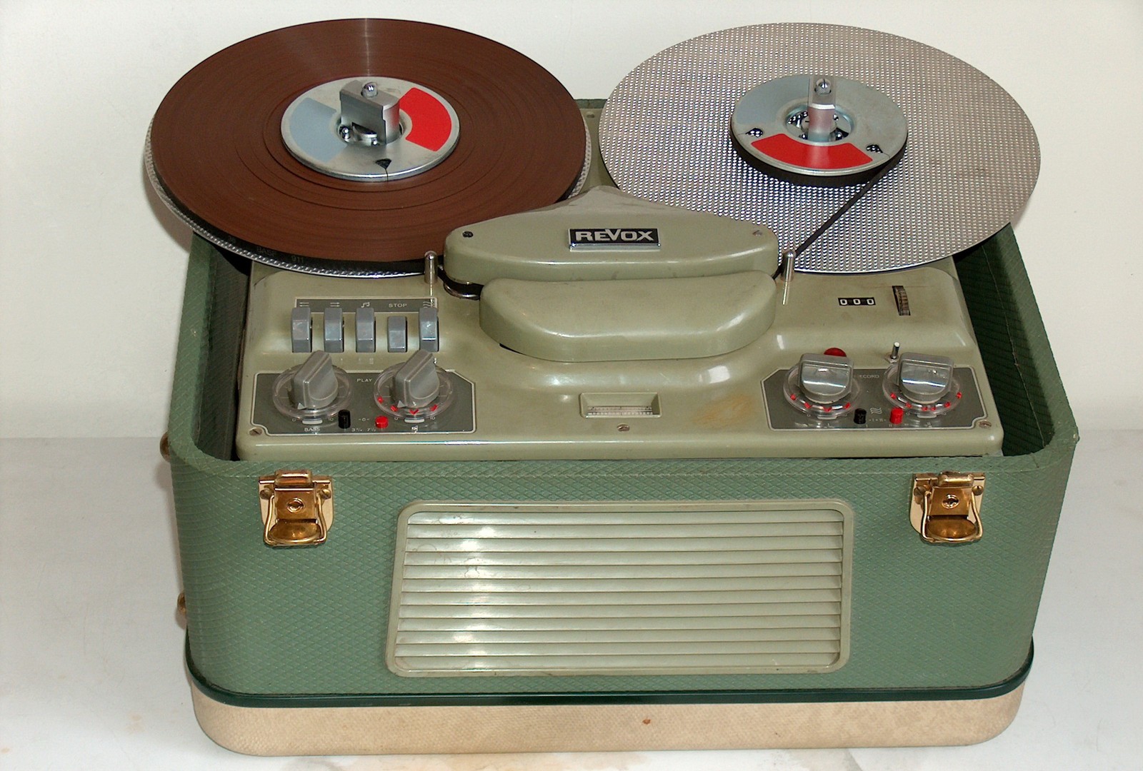 A portable Studer Revox reel-to-reel tape recorder with two reels and operating controls.