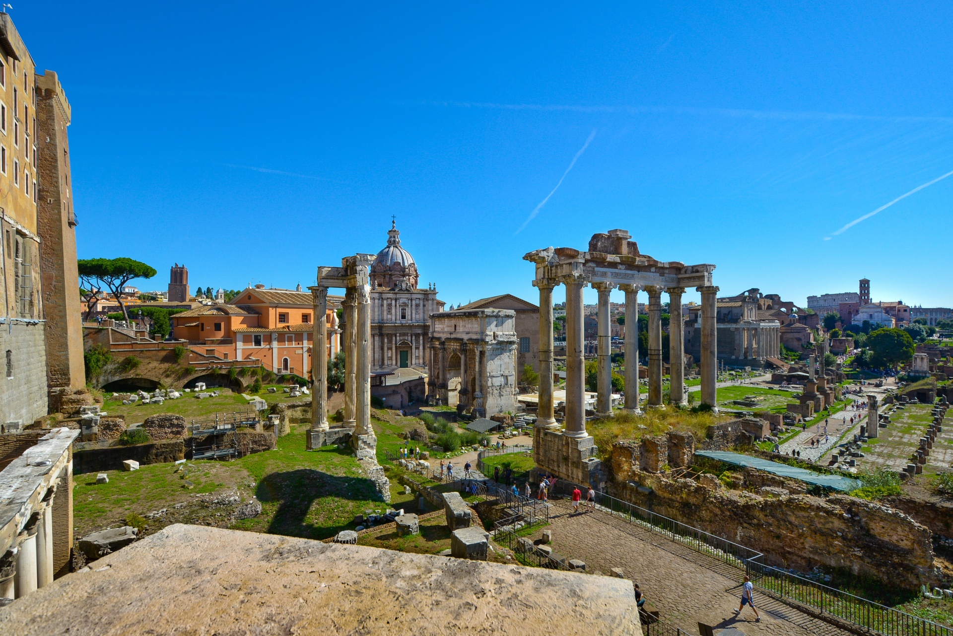 A present-day view of the Roman Forum’s paths, columns, and temple ruins