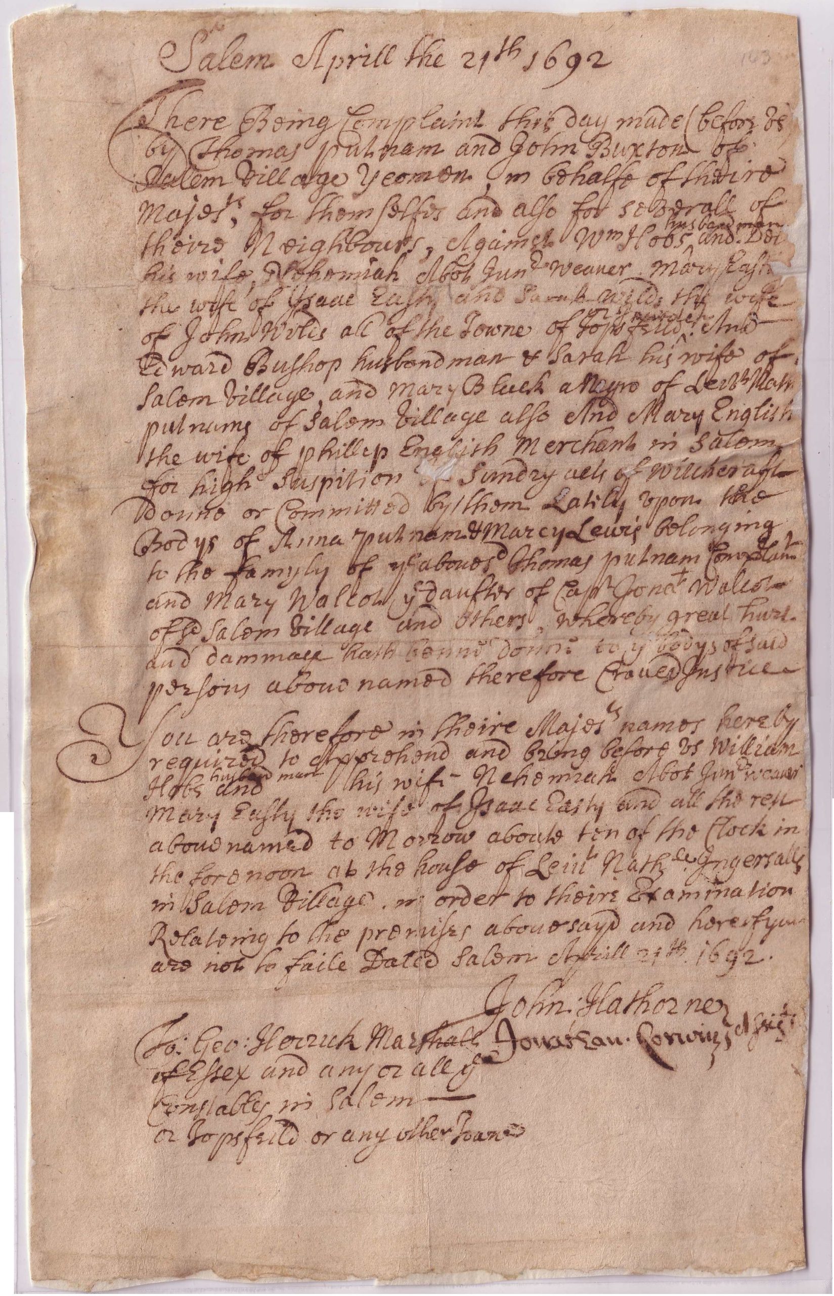 Handwritten April 21, 1692 warrant ordering the arrest of nine people accused of witchcraft.