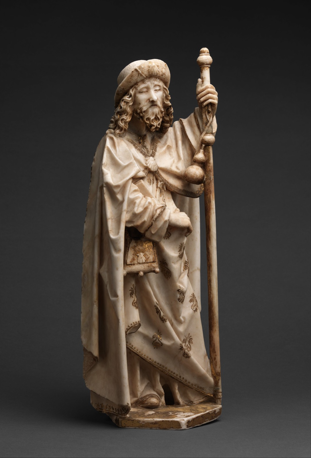 Alabaster Saint James with pilgrim hat, staff, bag and scallop-shell attributes